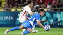 Jepang akhirnya memastikan diri menjadi pemuncak klasemen grup D usai menang 1-0 atas Israel. (ROMAIN PERROCHEAU / AFP)