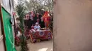 Sebagai informasi, fanous merupakan lentera tradisional berwarna-warni yang digunakan sebagai dekorasi khas untuk merayakan bulan suci Ramadan. Tampak dalam foto, Rehan Hazem Sharab, seorang pengungsi Palestina berusia 32 tahun, membuat lampion buatan tangan dari kotak-kotak bantuan yang tersisa sebagai persiapan menyambut bulan suci Ramadan yang dimulai pada 17 Februari, di luar tendanya di lingkungan Al-Mawasi, Khan Younis, di Jalur Gaza selatan pada Sabtu 7 Februari 2026. (Bashar Taleb/AFP)