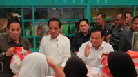 Presiden Joko Widodo (Jokowi) blusukan ke Pasar Bululawang, Kecamatan Bululawang, Kabupaten Malang, Jawa Timur. Kali ini Jokowi ditemani Prabowo Subianto dan Erick Thohir.