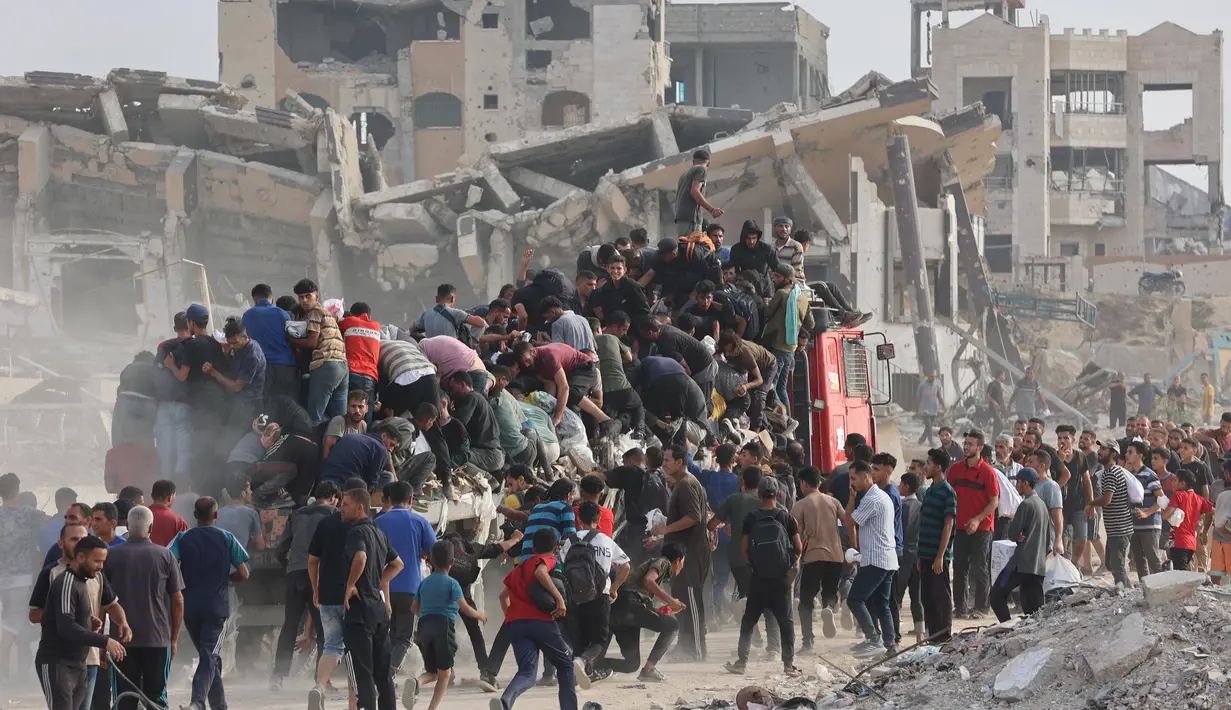Sementara 26 orang lainnya tewas akibat serangan di area dekat pusat distribusi bantuan Gaza, yang dikenal sebagai koridor Netzarim, yang dikuasai Israel. (Omar AL-QATTAA/AFP)
