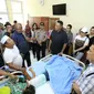 Kapolda Sumut motivasi bocah yang ditanam ayahnya hidup-hidup. Foto: (Reza Efendi/Liputan6.com)