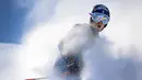 Tommy Ford berhasil melewati garis finis di babak 2 balapan Giant Slalom Putra dalam FIS Alpine ski World Cup. (Foto:AFP/Fabrice Coffrini)