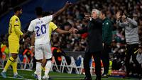 Pelatih Real Madrid, Carlo Ancelotti, berhasil membawa timnya lolos ke semifinal Liga Champions setelah mendepak Chelsea dengan agregat 5-4 pada perempat final. (AFP/PIERRE-PHILIPPE MARCOU)