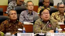 Menteri PPN/Kepala Bappenas Bambang Brodjonegoro  dan Gubernur Bank Indonesia (BI) Perry Warjiyo saat rapat kerja dengan Banggar DPR, Jakarta, Selasa (4/9). Rapat kerja membahas penyampaian pokok-pokok RUU APBN 2019. (Liputan6.com/JohanTallo)