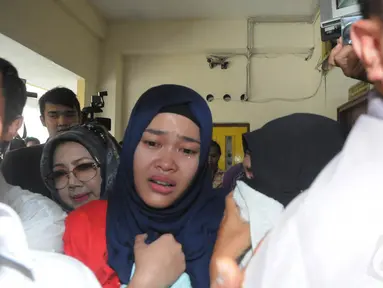 Pelaku pembunuhan Ade Sara, Assyifa Ramadhani divonis 20 tahun penjara oleh Pengadilan Negeri Jakarta Pusat, Selasa (9/12/2014). (Liputan6.com/Herman Zakharia)