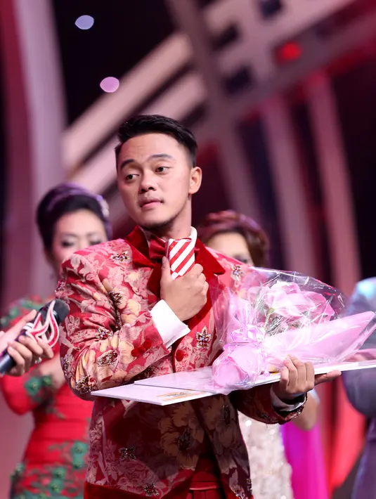 Tak heran jika Danang menjadi jawara di kompetisi musik dangdut yang diikuti empat negara ini, sejak awal ia sangat konsisten memberikan penampilan terbaik. Ia pun berhak mengantongi uang senilai Rp. 150 juta. (Andy Masela/Bintang.com)