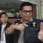 Ketua Tim Media Satgas Antimafia Bola Kombes Pol Argo Yuwono memberi keterangan pers terkait penggeledahan kantor PSSI di FX Tower, Jakarta, Rabu (30/1). Penggeledahan merupakan pengembangan dari laporan tersangka sebelumnya. (Liputan6.com/Faizal Fanani)