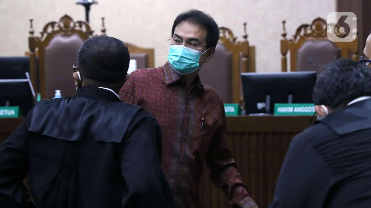 FOTO: Azis Syamsuddin Jalani Sidang Dakwaan Suap Pengurusan Perkara