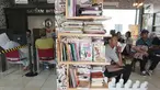Warga menunggu pembuatan Surat Keterangan Catatan Kepolisian (SKCK) dengan membaca di perpustakaan mini di Mapolres Tangerang Selatan, Banten, Kamis (5/7). Selain memberi rasa nyaman, hal ini juga untuk meningkatkan minat baca. (Merdeka.com/Arie Basuki)