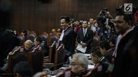 Ketua Tim Hukum Joko Widodo-Ma’ruf Amin, Yusril Ihza Mahendra saat tiba untuk mengikuti sidang sengketa Pilpres 2019 di Gedung MK, Jakarta, Selasa (18/6/2019). Sidang beragendakan mendengarkan jawaban dari termohon. (Liputan6.com/Faizal Fanani)