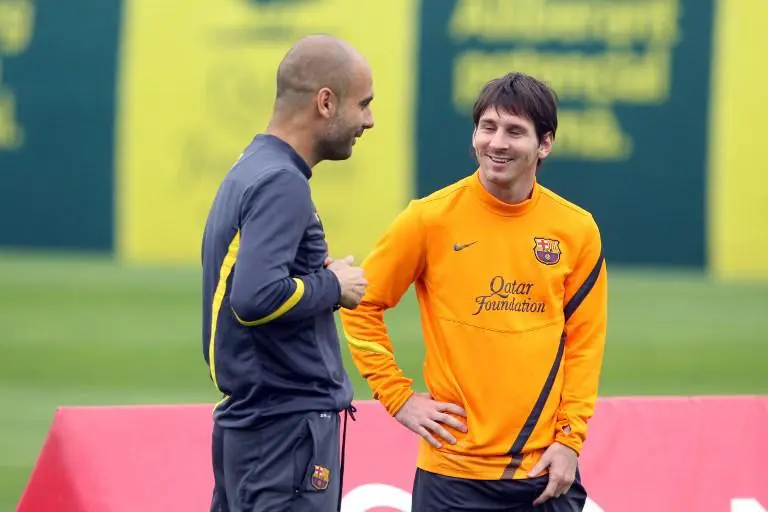 Pep Guardiola dan Lionel Messi dinilai paling sempurna menerapkan false nine. (AFP/Miguel Ruiz)