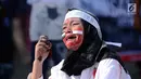 Peserta aksi melakukan teatrikal tentang kekejaman tentara Israel di kawasan Bundaran HI, Jakarta, Minggu (10/12). Mereka memprotes keputusan Presiden AS Donald Trump yang mengakui Yerusalem sebagai Ibu Kota Israel. (Liputan6.com/Helmi Fithriansyah)