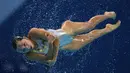 Anggota tim renang indah Tiongkok beraksi di nomor Team Free Combination Kejuaraan Dunia Akuatik 2015 di Kazan, Rusia. (26/7/2015). (AFP PHOTO/Christophe Simon)
