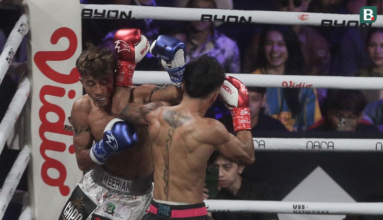 Sejumlah pertandingan seru dan menarik tersaji dalam Byon Combat Showbiz Vol. 5 di Tennis Indoor Senayan, Jakarta Pusat, pada Sabtu (28/6/2025). (Bola.com/M Iqbal Ichsan)