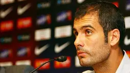 Coach of the Barcelona football team Josep Guardiola attend a press conference to explain the dispute over Lionel Messi and his participation in the Olympic Games in Beijing on August 7, 2008 in Barcelona. AFP PHOTO/JOSEP LAGO.