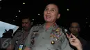 Kepala Divisi Hukum Mabes Polri Irjen Pol Mochamad Iriawan (depan) menyambangi gedung KPK di Jakarta, (25/2). Iriawan mengaku akan berkoordinasi dan diskusi dengan pimpinan lembaga antirasuah tersebut. (Liputan6.com/Helmi Afandi)