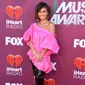 Penyanyi Agnez Mo berpose saat menghadiri iHeartRadio Music Awards 2019 di Los Angeles, California, AS, Kamis (14/3). Agnez Mo meraih iHeartRadio Music Awards 2019 setelah menang vote di media sosial. (Frazer Harrison/Getty Images North America/AFP)