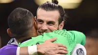 Bale gembira bisa juara Liga Champions di kampung halamannya, Cardiff City (Filippo MONTEFORTE / AFP)