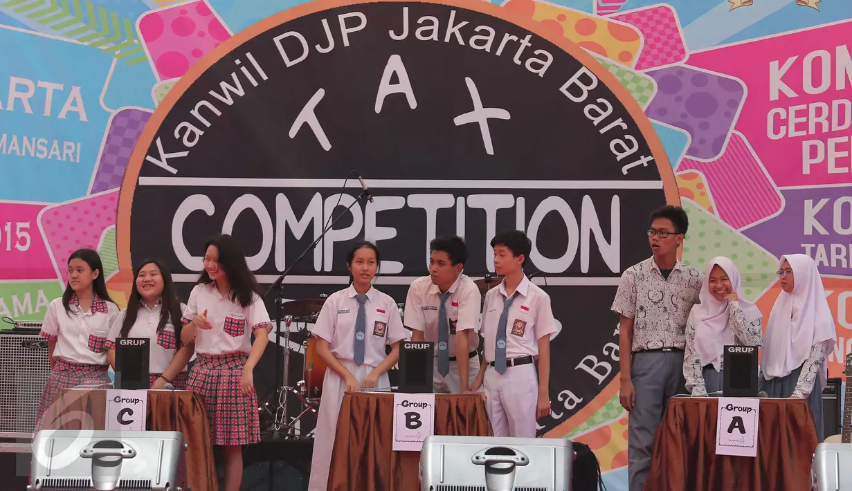 Kanwil DJP Jakbar menggelar Tax Competition 2015 yang berisi lomba cerdas cermat, tari tradisonal dan jinggel pajak, Jakarta, Senin (23/11/2015). Kompetisi tersebut untuk memberikan edukasi pajak dan budaya nusantara sejak dini (Liputan6.com/Angga Yuniar)