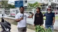 Pelaku penikaman abang bentor saat diringkus Polres Gorontalo Kota (Arfandi/Liputan6.com)