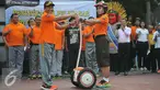 Kapolda Metro Jaya, Irjen Pol Tito Karnavian meluncurkan Satuan Segway Direktorat Pengaman Objek Vital di Bundaran HI, Jakarta, Minggu (13/9/2015). Sebanyak 7 segway baru dipakai untuk pengamanan jalannya car free day. (Liputan6.com/Gempur M Surya)
