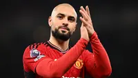 Gelandang MU, Sofyan Amrabat. (OLI SCARFF / AFP)
