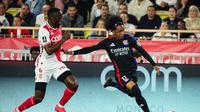 Penyerang Lyon asal Belgia, Malick Fofana (kanan). (CLEMENT MAHOUDEAU / AFP)