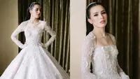 Lihat di sini tampilan princess Beby Tsabina pakai wedding dress bertabur ribuan kristal rancangan Monica Ivena.