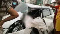 Suzuki Ertiga Dihantam Kereta di Sawah Besar