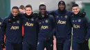 Pemain Manchester United, Antonio Valencia, Ander Herrera, Eric Bailly, Romelu Lukaku dan Marcos Rojo saat mengikuti sesi latihan di kompleks Pelatihan Carrington, Inggris (11/12). MU akan melawan Valencia di Liga Champions. (AFP Photo/Lindsey Parnaby)