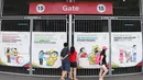 Sosialisasi aturan dan himbauan kepada penonton SEA Games di tempel di pintu-pintu masuk Stadion Nasional Singapura jelang SEA Games 2015. (Bola.com/Arief Bagus)