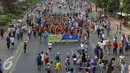 Festival Anak Asuh GNOTA menampilkan ratusan anak yang mengenakan busana daerah Indonesia, Jakarta, Minggu (1/11/2015). GNOTA meriahkan Hari Sumpah Pemuda dengan menggelar Festival Anak Asuh saat Car Free Day. (Liputan6.com/Yoppy Renato)