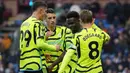 Berikutnya Arsenal sukses mengalahkan tuan rumah Burnley dengan skor 5-0 pada laga pekan ke-25 di Turf Moor Stadium (17/2/2024). Bukayo Saka lagi-lagi membuat brace pada laga ini, yaitu pada menit ke-41 dan 47. Tiga gol lainnya dicetak masing-masing oleh Martin Odegaard (4'), Leandro Trossard (66') dan Kai Havertz (78'). (AFP/Andy Buchanan)
