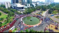  Ribuan buruh perlahan memadati persimpangan Patung Kuda, Silang Monas, Jakarta Pusat. (Liputan6.com/Richo Pramono)