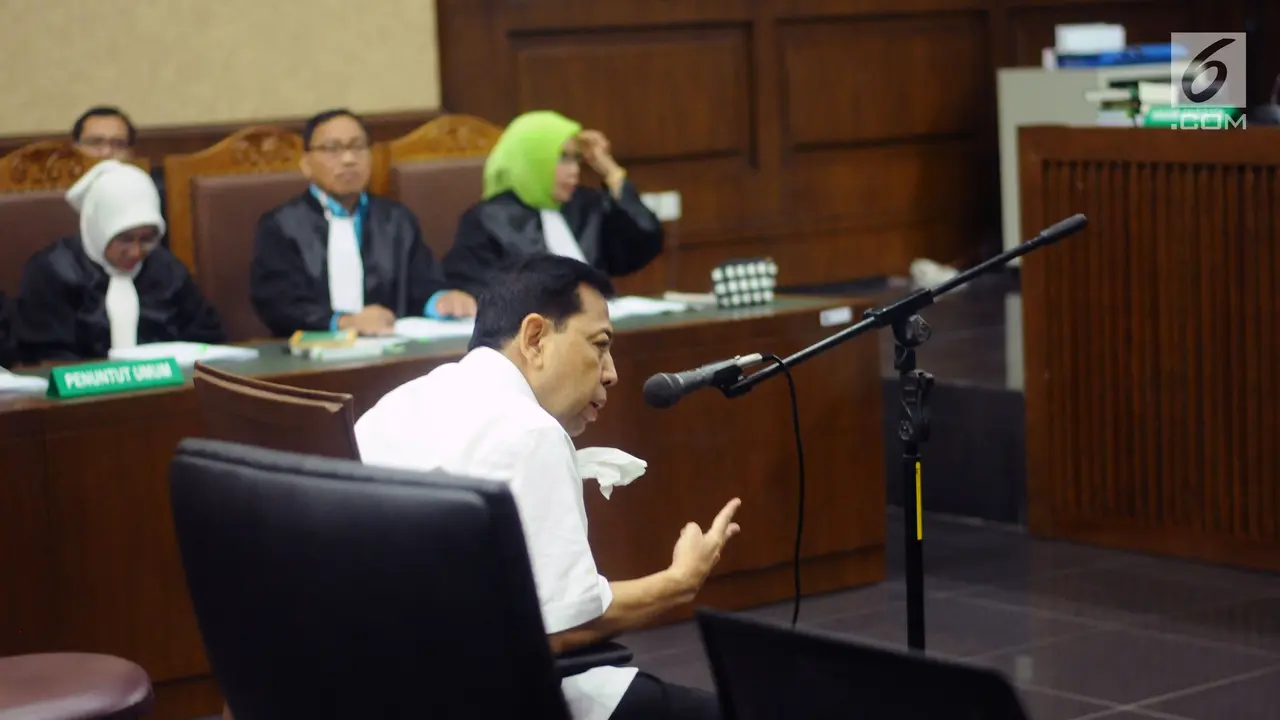 Dipapah Petugas, Setya Novanto Jalani Sidang Dakwaan Korupsi e-KTP