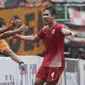 Bek Persija Jakarta, Ryuji Utomo, merayakan gol yang dicetaknya ke gawang TIRA Persikabo pada laga Piala Indonesia di Stadion Patriot, Bekasi, Kamis (21/2). Persija menang 2-0 atas TIRA Persikabo. (Bola.com/Yoppy Renato)