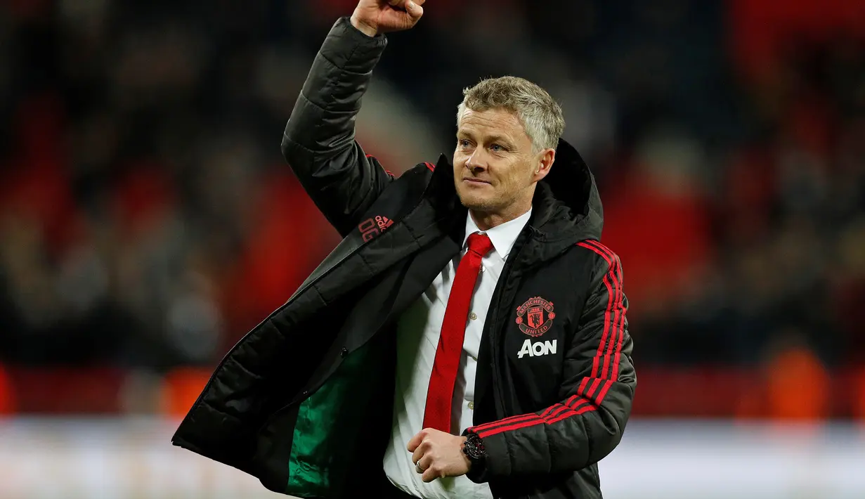 Ekspresi kemenangan Ole Gunnar Solskjaer pada laga lanjutan Premier League yang berlangsung di stadion Wembley, Inggris, Minggu (13/1). Man United menang atas Tottenham Hotspur 1-0. (AFP/Adrian Dennis)