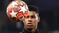 Louis van Gaal merupakan pelatih pertama yang memainkan Marcus Rashford bersama tim senior Manchester United. (Photo by Anne-Christine POUJOULAT / AFP)