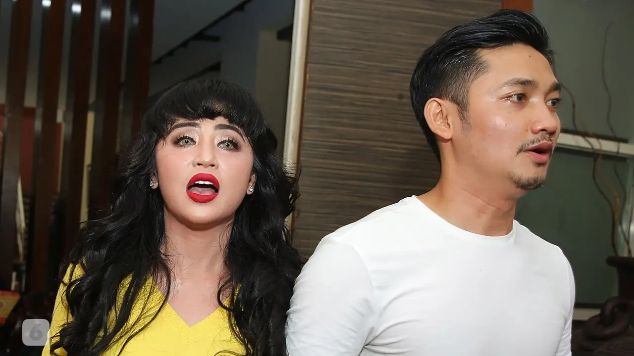 [Bintang] Dewi Perssik dan Sang Suami Laporkan Petugas Transjakarta di Polda Metro Jaya