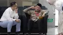 Penasihat Khusus Presiden Bidang Haji, Muhadjir Effendy (tengah), saat menunggu waktu pemeriksaan di Gedung Merah Putih Komisi Pemberantasan Korupsi (KPK), Jakarta, Senin (18/5/2026). (Liputan6.com/Helmi Fithriansyah)