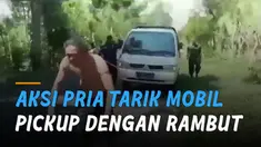 Video aksi seorang pria menarik mobil pick up dengan rambut mengundang perhatian.