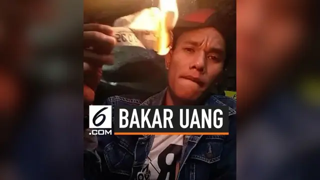 Viral seorang pria membakar uang secara live di Facebook. Sontak aksinya tersebut mengundang perhatian warganet.