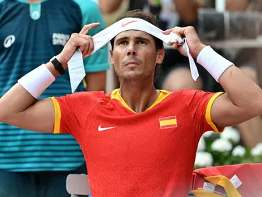 Juara Grand Slam 22 kali Rafel Nadal mengatakan tidak akan berkompetisi di US Open karena khawatir tidak dapat memberikan penampilan yang terbaik. (Miguel MEDINA / AFP)