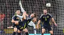 Pemain Portugal, Cristiano Ronaldo, berusaha melepaskan tendangan salto saat melawan Skotlandia dalam duel lanjutan UEFA Nations League 2024/2025 Grup A1 di Hampden Park, Rabu (16/10/2024). (Andrew Milligan/PA via AP)
