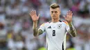 Toni Kroos juga menjadi bagian timnas Jerman saat menjadi juara Piala Dunia pada 2014. (THOMAS KIENZLE/AFP)