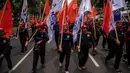 Aksi unjuk rasa untuk menuntut pemerintah menaikkan upah minimum provinsi (UMP) 2025 sebesar 8 hingga 10 persen. (JUNI KRISWANTO/AFP)