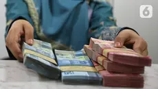 Rupiah Dibuka Menguat, Tapi Masih di Kisaran 18.000 per Dolar AS