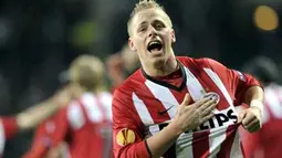 PSV Eindhoven's Balázs Dzsudzsák celebrates his 2-0 goal against Hamburger SV during their UEFA Europe League football match on February 25, 2010, in Eindhoven. AFP PHOTO/ ANP/ PAUL VREEKER