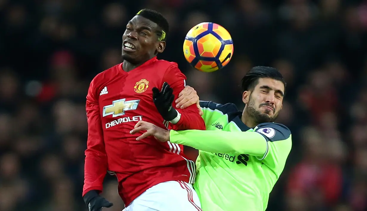 Manchester United dan Liverpool bermain imbang di matchday 21 Premier League di Old Trafford, Minggu (15/1). Keduanya berbagi angka usai imbang dengan skor 1-1. (AP Photo/Dave Thompson)