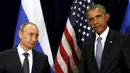 Presiden AS, Barack Obama dan Presiden Rusia, Vladimir Putin saat bertatap muka pada Sidang Umum PBB di New York, Senin (28/9/2015). (REUTERS/Kevin Lamarque)